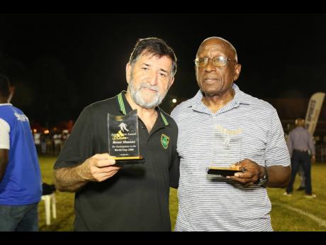 Rene Simoes (left), who led the Reggae Boyz to the 1998 World Cup, and another former national head coach, Carl Brown, were among honourees at the Porus Football Festival in Manchester on Sunday.
