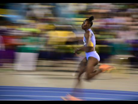 Shericka Jackson competes in the women’s 200 metre final during the JAAA National Senior and Junior Championship held at the National Stadium in St Andrew recently.