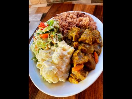 Nadalee Tennyson’s favourite meal: curried goat with traditional rice and peas, tossed salad and potato salad.