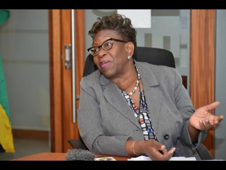 Director of Public Prosecutions Paula Llewellyn, speaking with reporters during a press conference at which she discussed protest action taken by prosecutors.