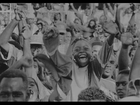 
Patrons cheering for their favourite artistes during the 1994 Reggae Sumfest held at Catherine Hall, Montego Bay.