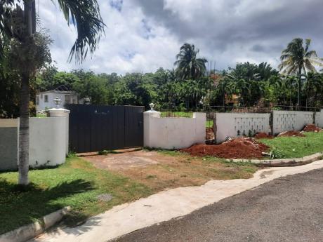 A controversial property at 24 Oakridge Road in Kingston, 8 for which two titles have emerged.
