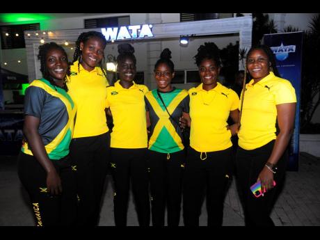 Crystal Plummer (second right) with teammates (from left) Kimone Shaw, Simone Gordon, Theresa Beckford, Shadine Bartley and Amanda Pinkney at the Sunshine Girls’ send-off party at the Summit House, 17 Ruthven Road in New Kingston, St Andrew, on July 11, 