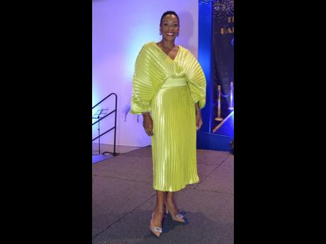 Attorney-at-law Rochelle Cameron was the mistress of ceremonies and performed her duties splendidly in a pleated satin midi dress.
