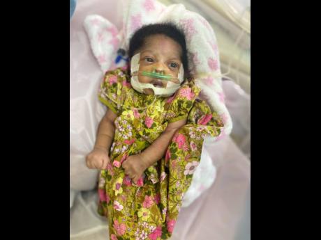 Newborn Harmony Wong, who was diagnosed with Hypoplastic Left Heart Syndrome and needs to be airlifted to the United States for corrective surgery.