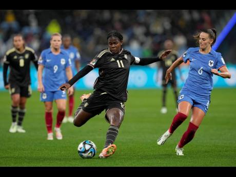 Jamaica’s Khadija Shaw gets in a shot during the Women’s World Cup Group F football match against France at the Sydney Football Stadium in Sydney, Australia, on Sunday, July 23.