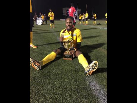 Odean ‘Bobo’ Irons celebrates winning a title at to the University of Maine at Fort Kent.