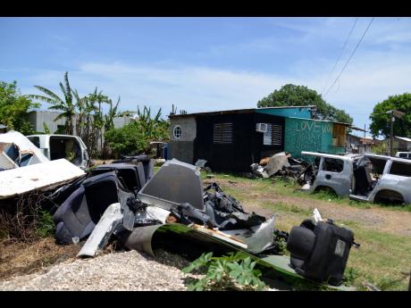 This makeshift car lot in Gordonwood in Old Harbour, St Catherine, was a site for stripping and storing stolen motor vehicles. The St Catherine police made the discovery, finding 30 motor vehicles reported stolen from across the island.