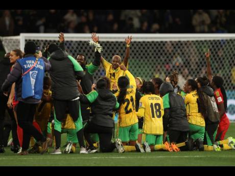 
Jamaica’s team members celebrates after the Women’s World Cup Group F football match against Brazil in Melbourne, Australia on Wednesday, August 2.