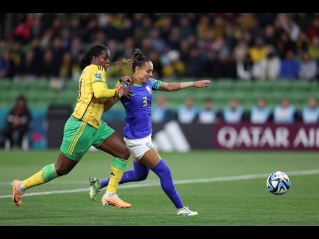 Jamaica’s Khadija Shaw (left) in action against Brazil’s Kathleen during the Women’s World Cup Group F soccer match between Jamaica and Brazil.