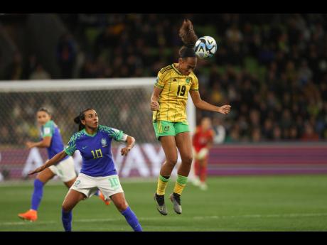 Jamaica’s Tiernny Wiltshire ( right) heads the ball ahead of Brazil’s Marta during the Women’s World Cup Group F  match between Jamaica and Brazil in Melbourne, Australia, on Wednesday, August 2, 2023. 