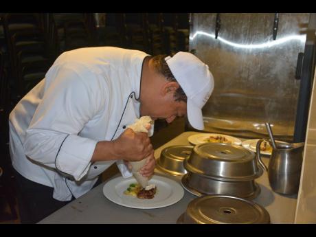 Secrets Resorts’ executive chef, Antonio Valerio. creating magic in the kitchen.