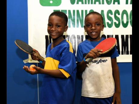 Shocoil Golding (left) winner of the boys’ under-9 title at the National Table Tennis Championships. He defeated Yashime Anderson (right) in the final.