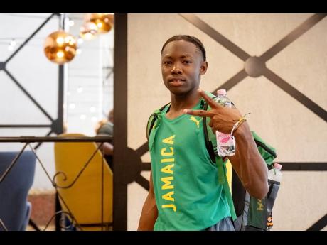 Jaydon Hibbert, the world leader in the men’s triple jump, reacts after a Jamaica team training session in Budapest, Hungary, yesterday. Hibbert will be in action on today’s opening day. 