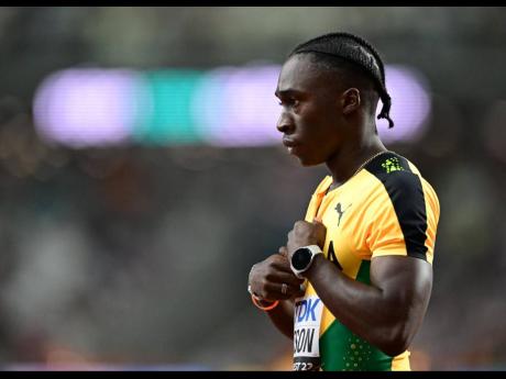 Jamaica's Rohan Watson contemplates after finishing second in his men's 100 metres heat at the World Championships in Budapest, Hungary today.