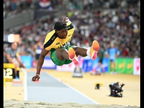 Jamaica’s Jaydon Hibbert soars through the air on his way to qualifying for the men’s triple jump final at the World Championships in Budapest, Hungary, today.