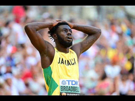 Jamaica’s Rasheed Broadbell reacts after falling in heat three of the men’s 110m hurdles at the morning session of the 2023 World Athletics Championships in Budapest, Hungary, yesterday. Broadbell was one of the favourites for the gold medal in the eve