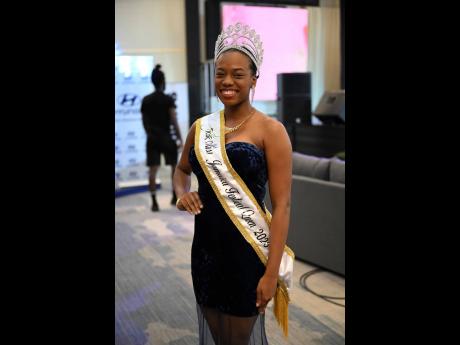 Nothing like queens supporting queens. We spotted Miss Jamaica Festival Queen Aundrene Cameron at the Miss Universe Jamaica Grand Coronation, ahead of the announcement of a new title-holder.