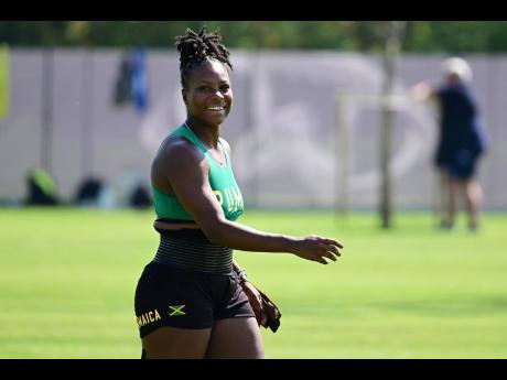 Jamaica’s Nayoka Clunis gets in a warm-up at a training session beside the National Athletics Centre, the venue of the WOrld Athletics Championships, ahead of her debut in the hammer throw today.