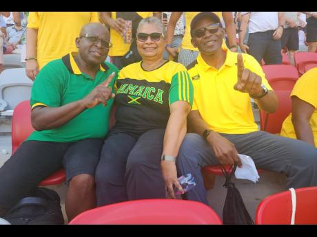 From left: Lincoln and Dr Rosalie Deane share lens time with Dr Cedric Lazarus at the World Athletics Championships in Budapest. The three are members of a team of 40 Jamaicans who studied in Budapest, Hungary and who have remained friends. 