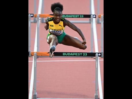 First time out and first across the tape, Ackera Nugent paints a determined picture after her first-round World Athletics Championships win in the 100-metre hurdles on Tuesday. 
