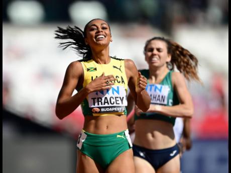 Jamaica’s Adelle Tracey displays her trademark grimmace during the first round of the women’s 800 metres at the World Athletics Championships in Budapest, Hungary, yesterday. 