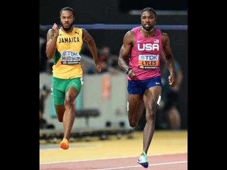 Jamaica’s Andrew Hudson battles with United States of America’s Noah Lyles during their semi-finals of the men’s 200 metres at the World Athletics Championships in Budapest, Hungary, today.