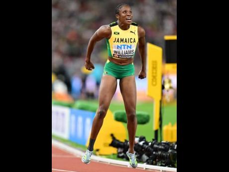 Jamaica’s Danielle Williams celebrates winning the women’s 100 metres at the World Athletics Championships in Budapest, Hungary, today.