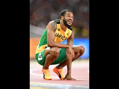 Jamaica’s Andrew Hudson contemplates after competing in the men’s 200 metres semi-finals at the World Athletics Championships at the National Athletics Centre in Budapest, Hungary, today.
