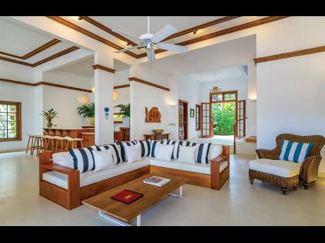 The striking and relaxed interior design exhibits Jamaican craftsmanship.