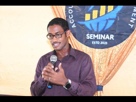 Ricardo Dystant, chief of digital transformation and special projects, JN Bank, delivers the keynote address at the Portmore Community College Accounting/Finance and Management Seminar held on August 17, under the theme: The Impact of Digital Transformatio