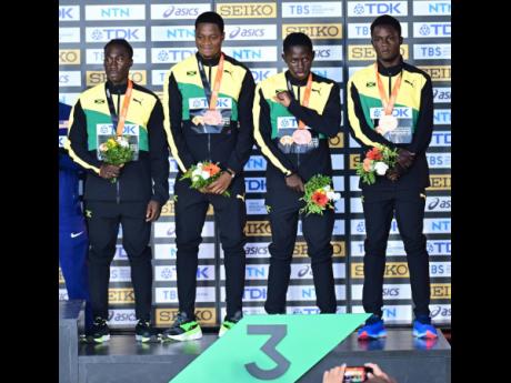 Medal Ceremony for the men’s 4x100m relay finals. From left: Jamaica’s Rohan Watson, Ryiem Ford, Oblique Seville and Ackeem Blake were presented a bronze medal. 