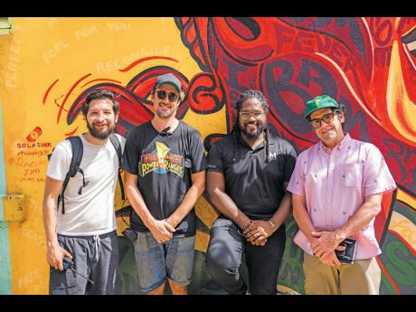From left: Julio Jamal, first assistant director (Mexico); James Costello, director of photography (Syndey Australia); Saeed Thomas, CEO, M-1 Productions; and Nick Lee, executive producer (LA, USA), on location in Jamaica.