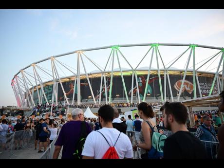 Hundreds of fans enter the stadium yesterday for the final  session of the 2023 World Athletics Championships held at the National Athletics Centre in Budapest, Hungary.