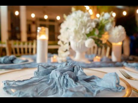  The colours for the wedding were dusty blue and white with hints of gold. 