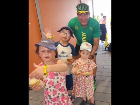Robert Richards provided all three of these children with Jamaican bracelets at the World Athletics Championships in Budapest, Hungary.