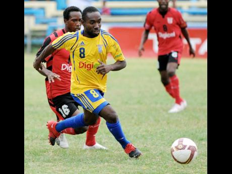 Richard Edwards on the ball for Harbour View during a Jamaica Premier League game against Arnett Gardens in 2010.