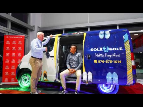 Toyota’s Managing Director Tom Connor and Dr Christopher Tufton discuss the Sole 2 Sole van’s first stop.