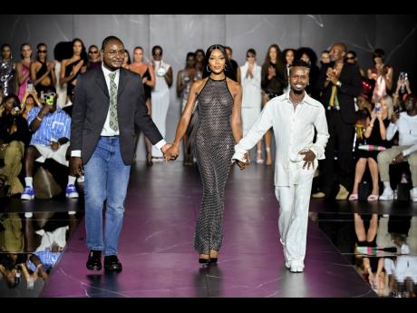 From left: Designers Victor Anate, Naomi Campbell and Edwin Thompson walk the runway at the PrettyLittleThing x Naomi Campbell Spring/Summer 2024 fashion show as part of New York Fashion Week on Tuesday in New York. 