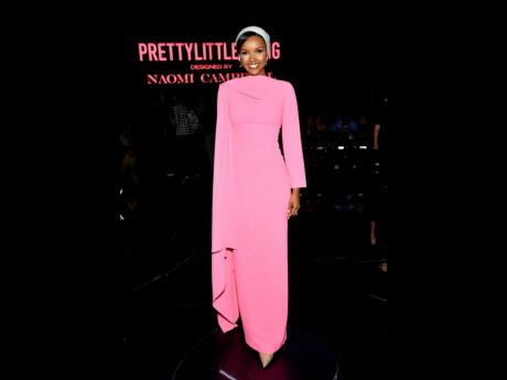 Halima Aden attends the PrettyLittleThing x Naomi Campbell Spring/Summer 2024 fashion show.