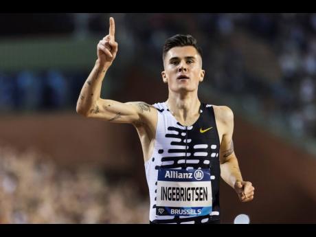Jakob Ingebrigtsen of Norway crosses the finish line to win the men’s 2000m in a new world record at the  Van Damme Memorial Diamond League athletics event at the King Baudouin stadium, Brussels yesterday. The new world record time is 4:43:13.Jakob Ingeb