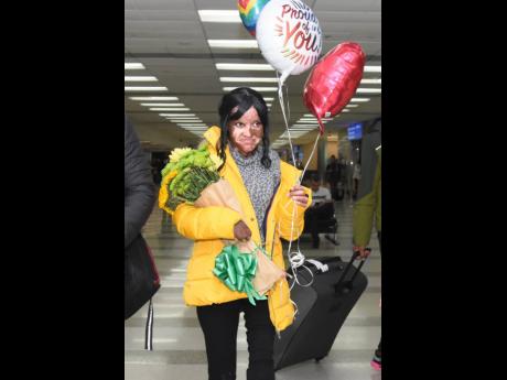 Westmoreland burn victim Adrianna Laing arrives at the Fort Lauderdale airport in Florida after being discharged from the Shriners Hospital for Children in Boston on March 28.
