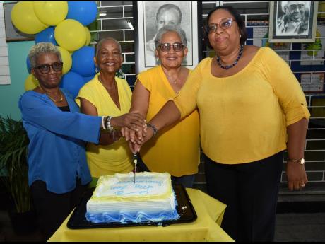 From left: Angela Chaplain, past student and former teacher; Beverley Ulett, principal emerita and one of the first three students to attend Vaz Prep; Paulette Ulett, past student and daughter of the founder Hazel Vaz; and Karlene Bisnott-Hemmings, princip