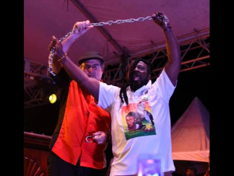 Opposition Leader Mark Golding ‘freed’ Claude ‘Big Stone’ Sinclair from bondage in a dramatic episode at the People’s National Party (PNP) president’s St Andrew South constituency conference last week.