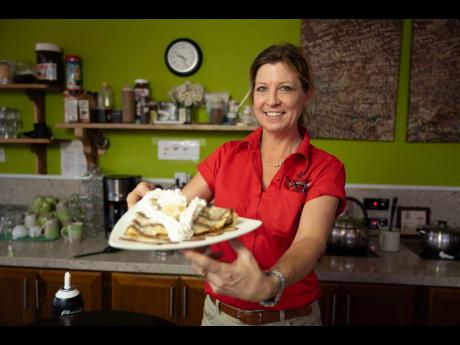Fresh off the cook top, Carrie ‘Quizz’ Sigurdson hands us a banana nutella crêpe.