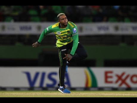 Jamaica Tallawahs’ Fabian Allen bowls on his way to figures of four for 25 against the St Lucia Kings in the first Caribbean Premier League eliminator at the Guyana National Stadium on Tuesday. 