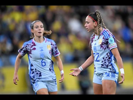 Spain’s Athenea del Castillo (right)  celebrates with Aitana Bonmati after scoring during the Women’s Nations League football match between Sweden and Spain at Gamla Ullevi in Gothenburg, Sweden yesterday.