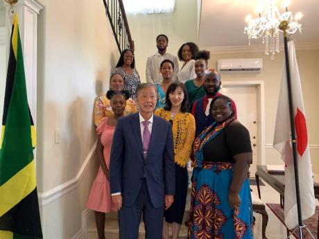 
In this July photo, members of the JET cohort pose for a photo with Ambassador of Japan to Jamaica Yasuhiro Atsumi at a send-off reception at the ambassador’s residence.