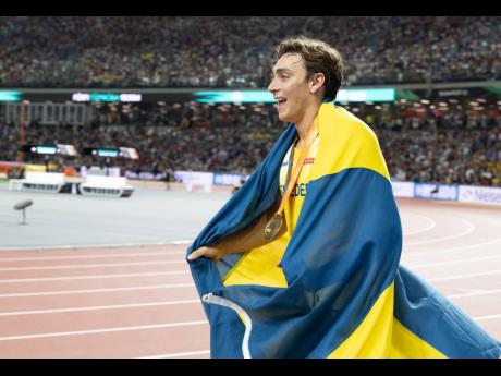 Armand ‘Mondo’ Duplantis of Sweden celebrates his win in the men’s pole vault at the 2023 World Athletics Championships in Budapest, Hungary.