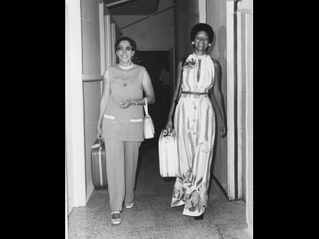 Miss Independence 1971 Marilyn Wright (right), as she prepares to leave the then Palisadoes International Airport by BWIA flight in July 1972, to represent Jamaica in the Miss Universe contest in San Juan, Puerto Rico. Her chaperone, Gloria Astwood, is on 